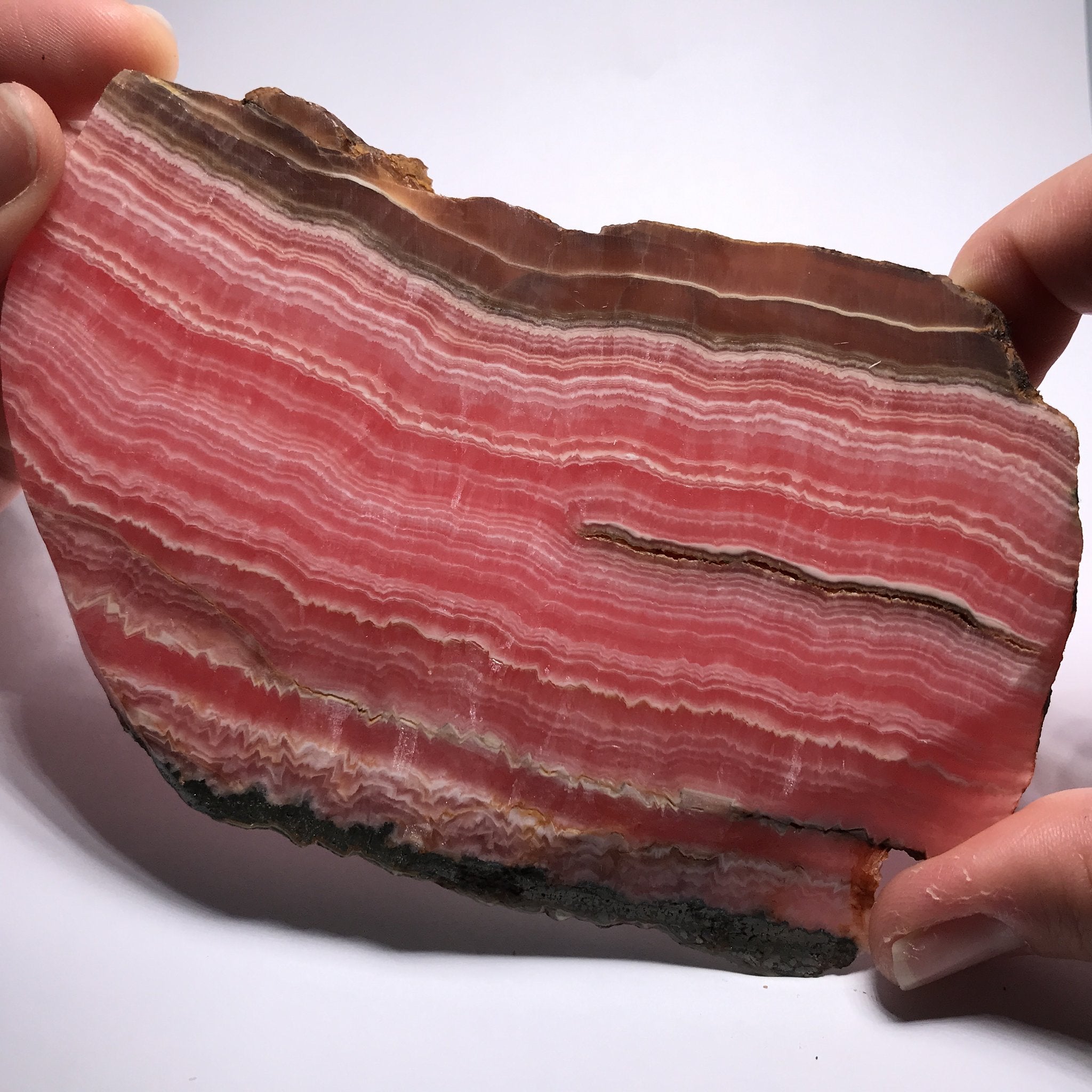 Rhodochrosite – Joe Henley Rough & Gemstones